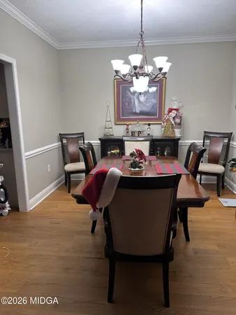 a view of a kitchen counter space a sink and dishwasher