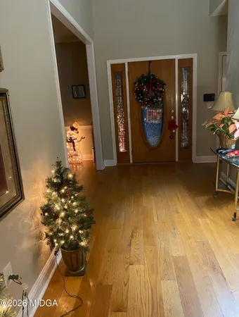 a view of empty room with ceiling fan