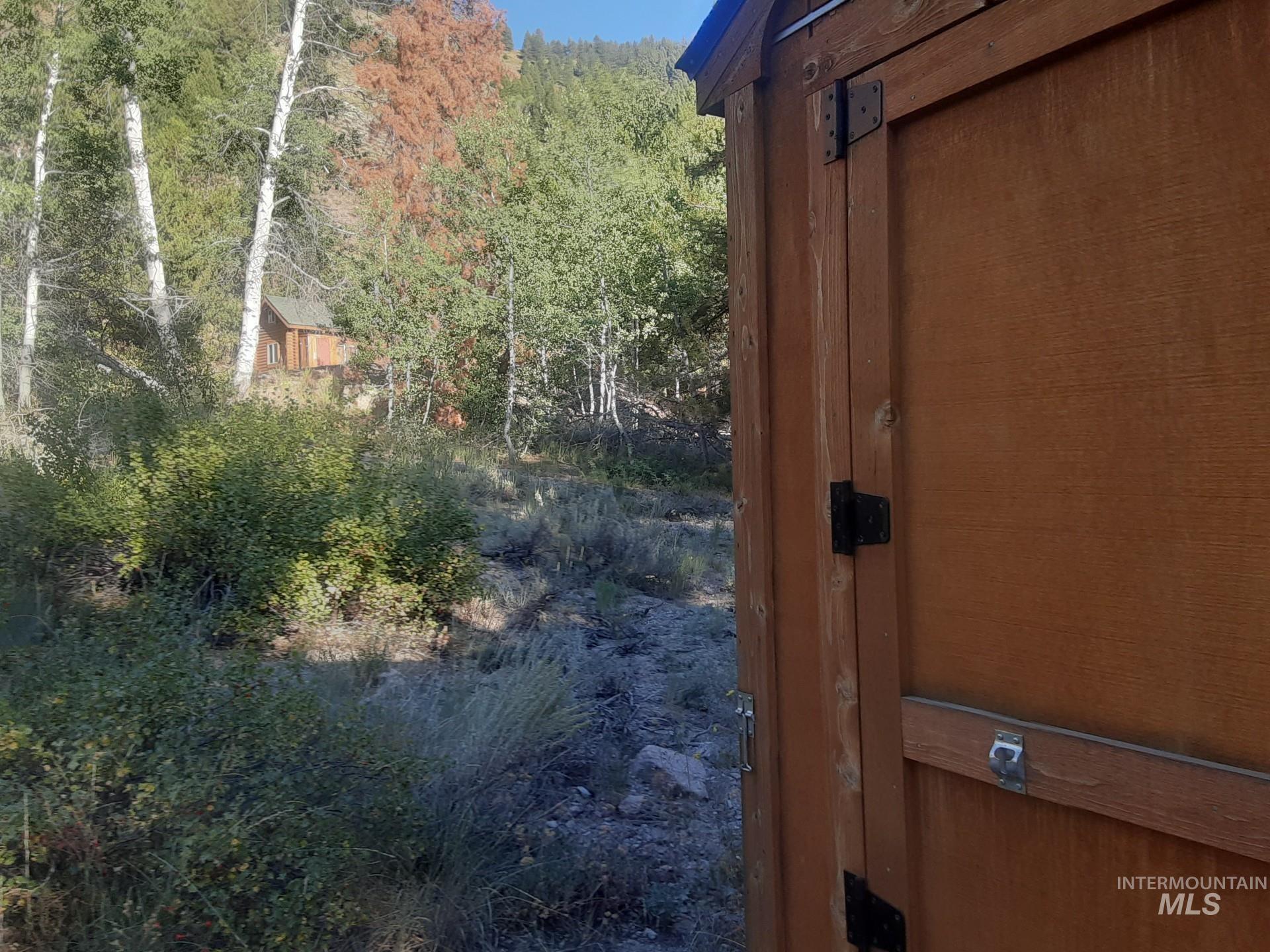 2074 Fleck Smt Road Fairfield, ID 83327 - Photo 22 of 22 Entryway with a forest view