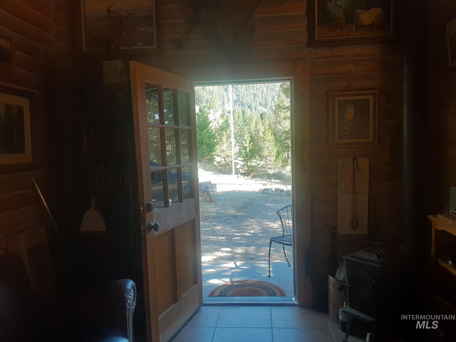 2074 Fleck Smt Road Fairfield, ID 83327 - Photo 8 of 22 Doorway featuring tile patterned flooring