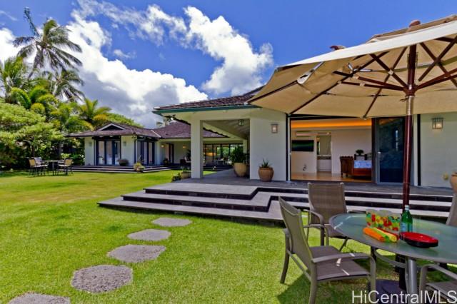 343 Dune Circle Kailua, HI 96734 - Photo 1 of 1 a view of an chairs and table in the patio