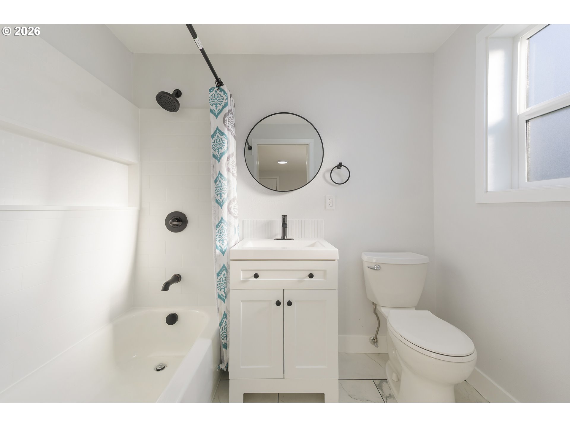 1243 Hayes Street Eugene, OR 97402 - Photo 35 of 48 a bathroom with a toilet a sink and mirror