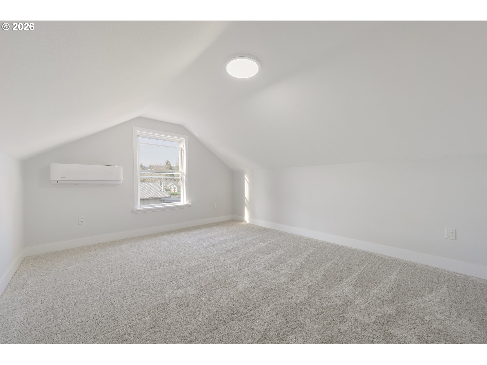1243 Hayes Street Eugene, OR 97402 - Photo 38 of 48 a view of an empty room with a window