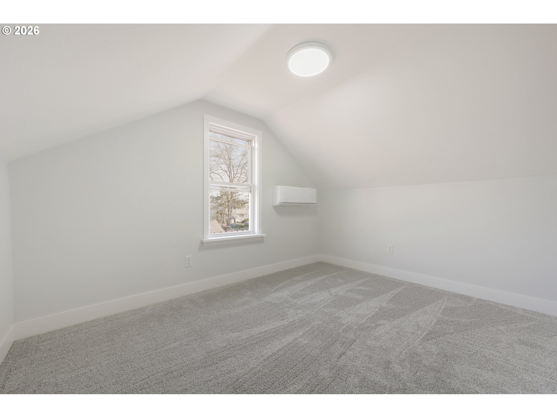 1243 Hayes Street Eugene, OR 97402 - Photo 41 of 48 a view of an empty room with a window