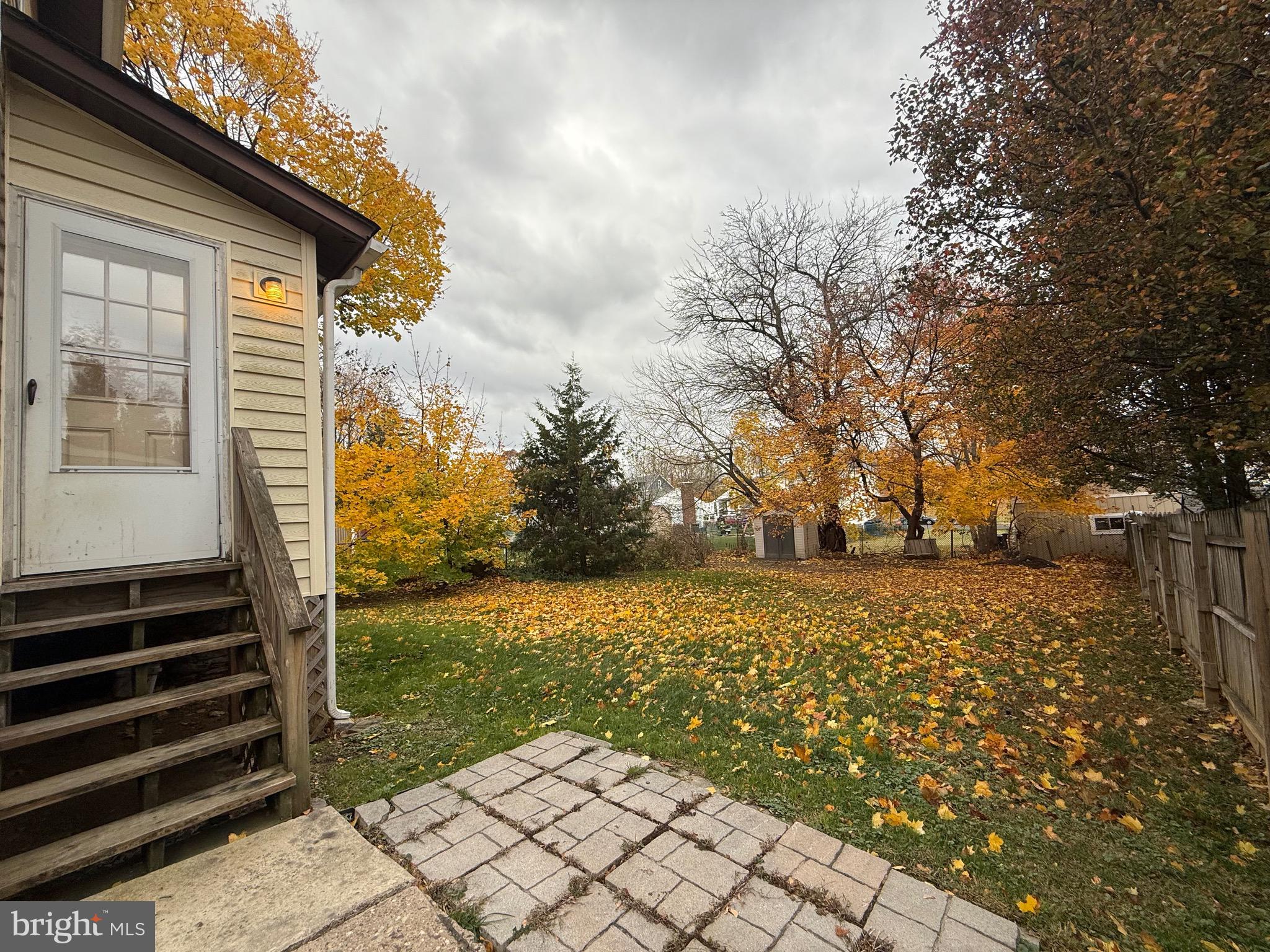 1740 Arnold Avenue Willow Grove, PA 19090 - Photo 12 of 22 a view of a yard with wooden fence