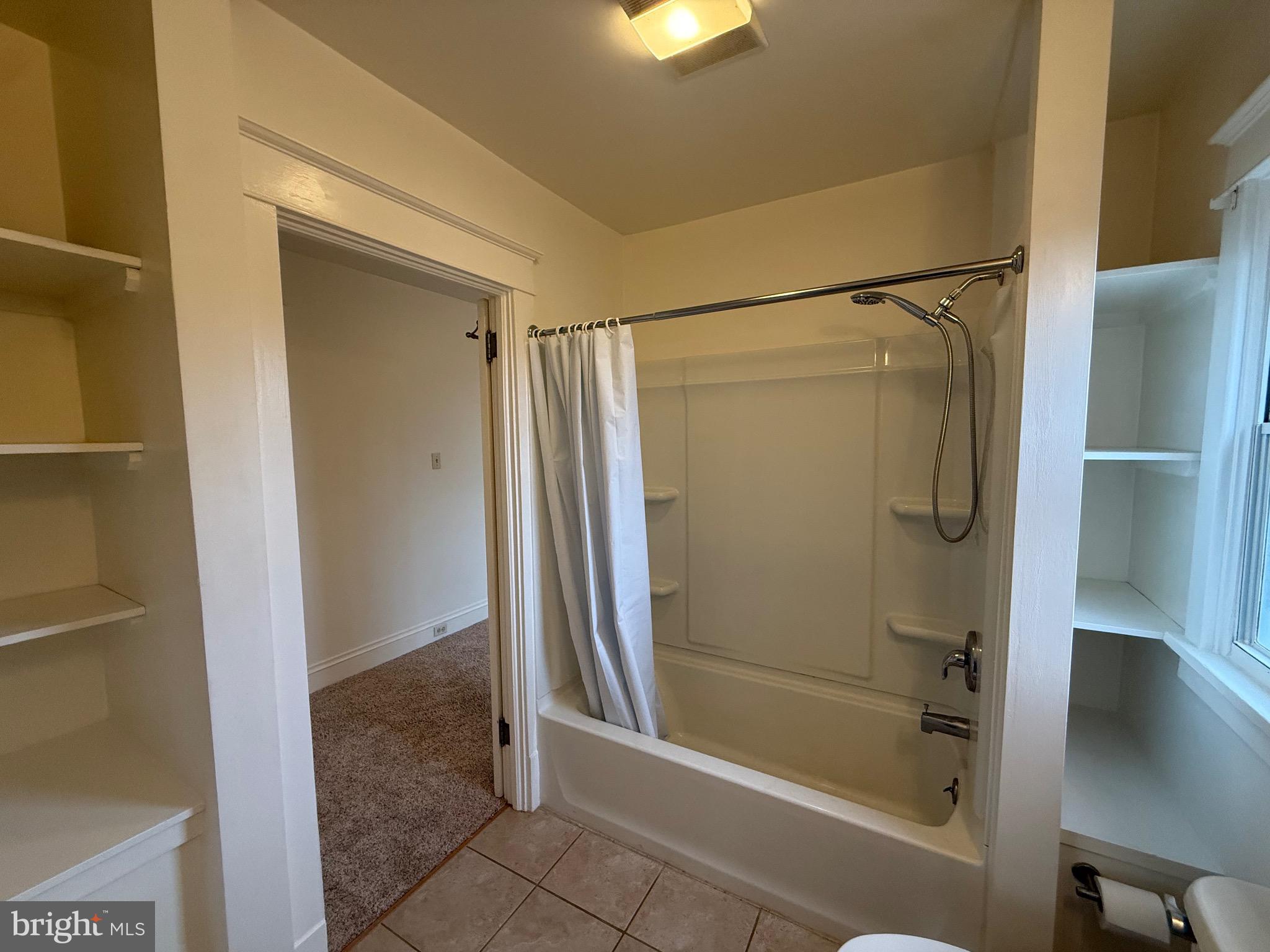1740 Arnold Avenue Willow Grove, PA 19090 - Photo 18 of 22 a bathroom with a glass shower door