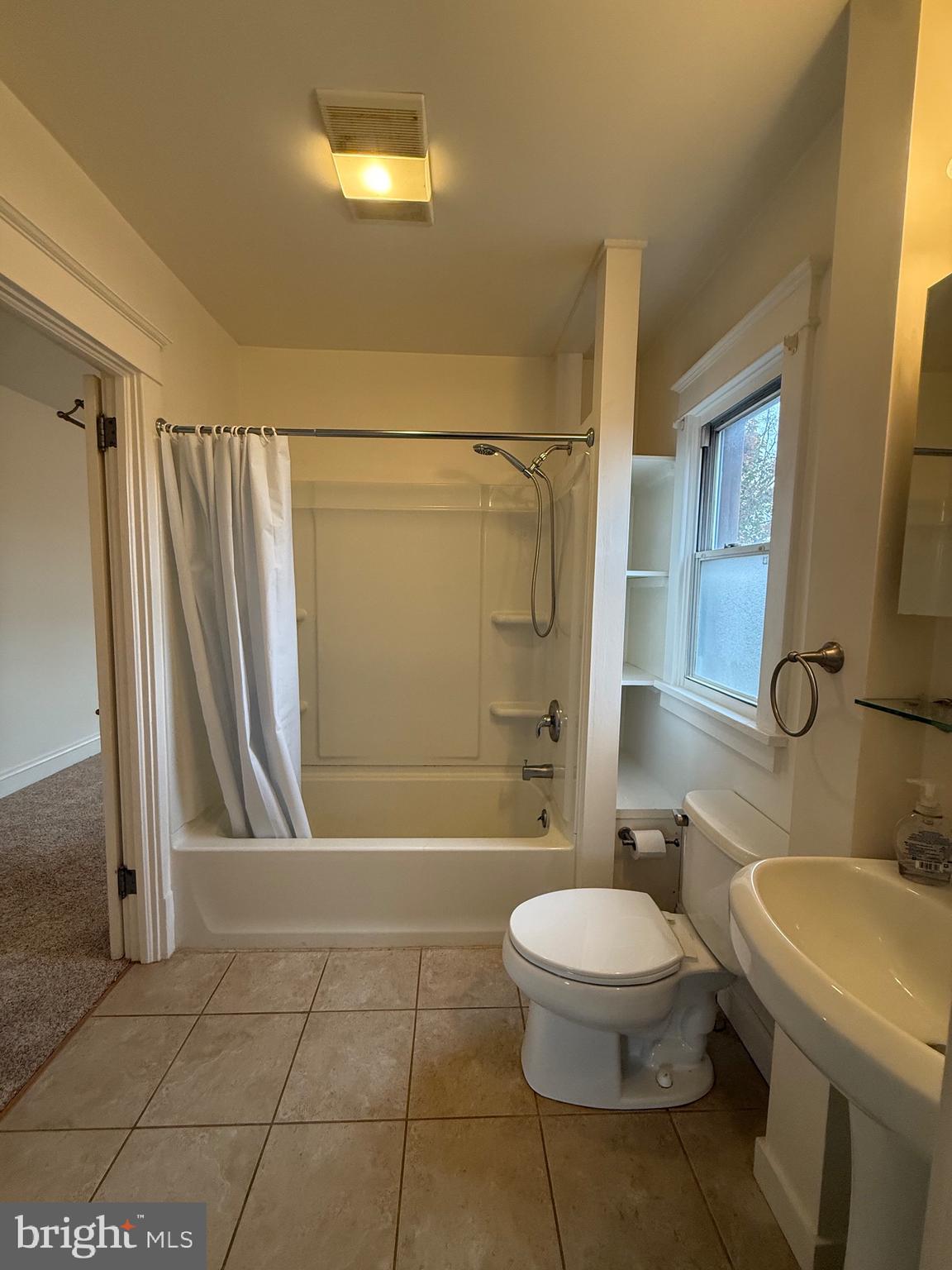 1740 Arnold Avenue Willow Grove, PA 19090 - Photo 19 of 22 a bathroom with a toilet a sink and a shower