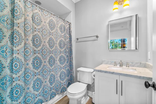 a bathroom with a sink and a toilet