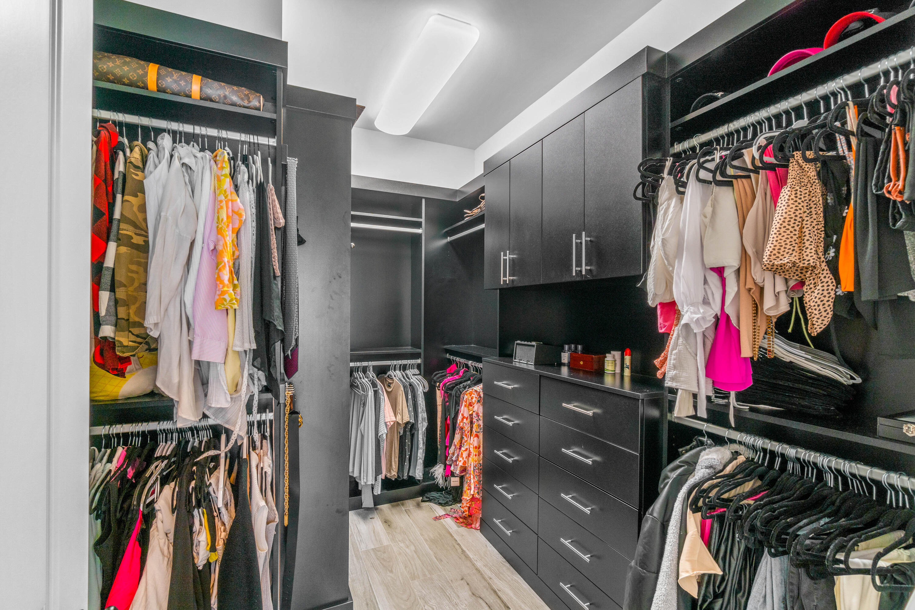308 West Cannery Row Circle Delray Beach, FL 33444 - Photo 22 of 23 a view of walk in closet with clothes and shoes