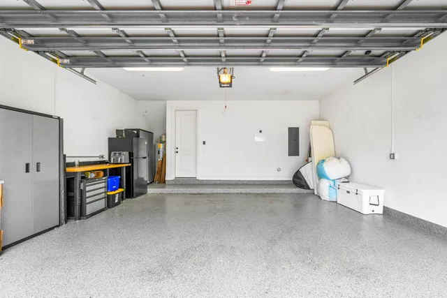 a bathroom with a sink vanity mirror and toilet