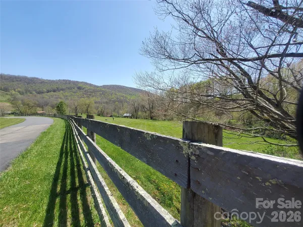 a view of a house with a big yard