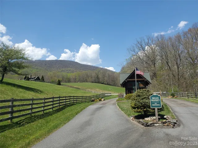 a view of a house with a big yard