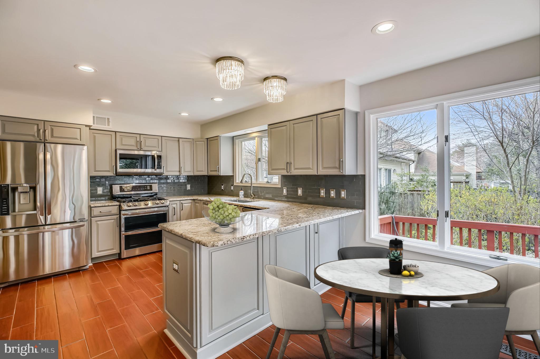 11805 Riding Loop Terrace North Potomac, MD 20878 - Photo 11 of 40 Renovated Kitchen and Sun-Drenched Breakfast Room