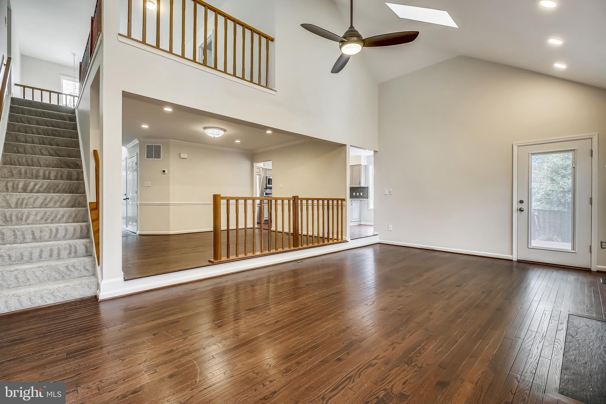 Living Room with Two Story Ceilings