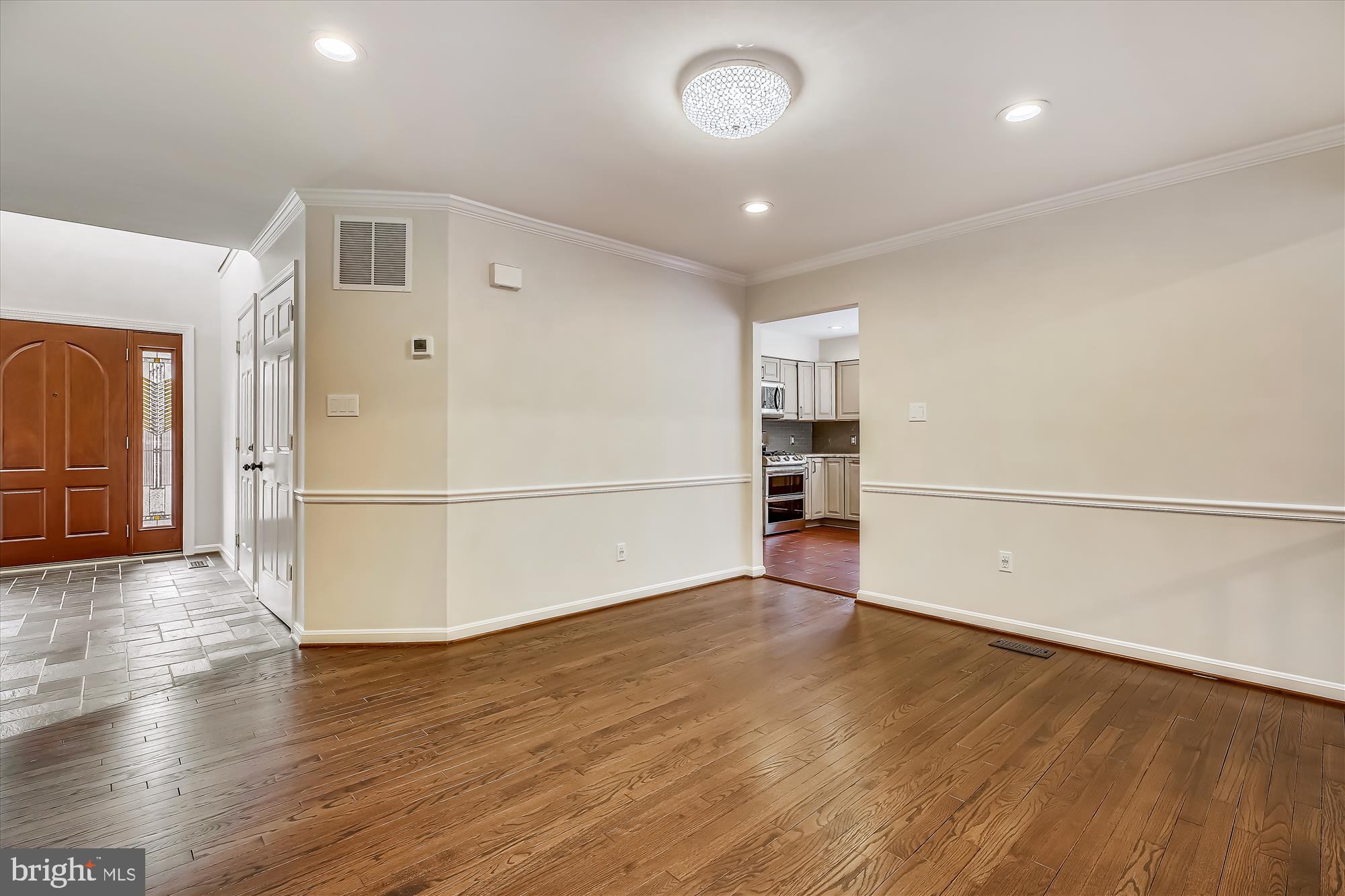 11805 Riding Loop Terrace North Potomac, MD 20878 - Photo 10 of 40 Dining Room with Chair Rail Molding