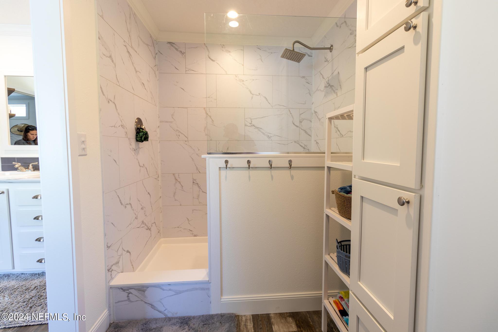 121 Honeysuckle Trail Hawthorne, FL 32640 - Photo 14 of 44 a bathroom with a shower