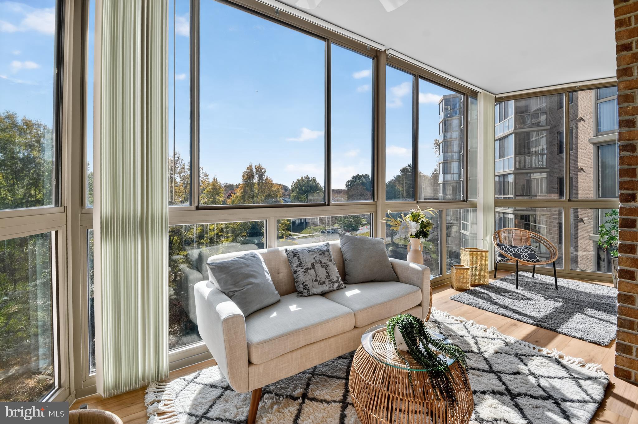 3005 South Leisure World Boulevard, Unit 426 Silver Spring, MD 20906 - Photo 16 of 45 a roof deck with couch