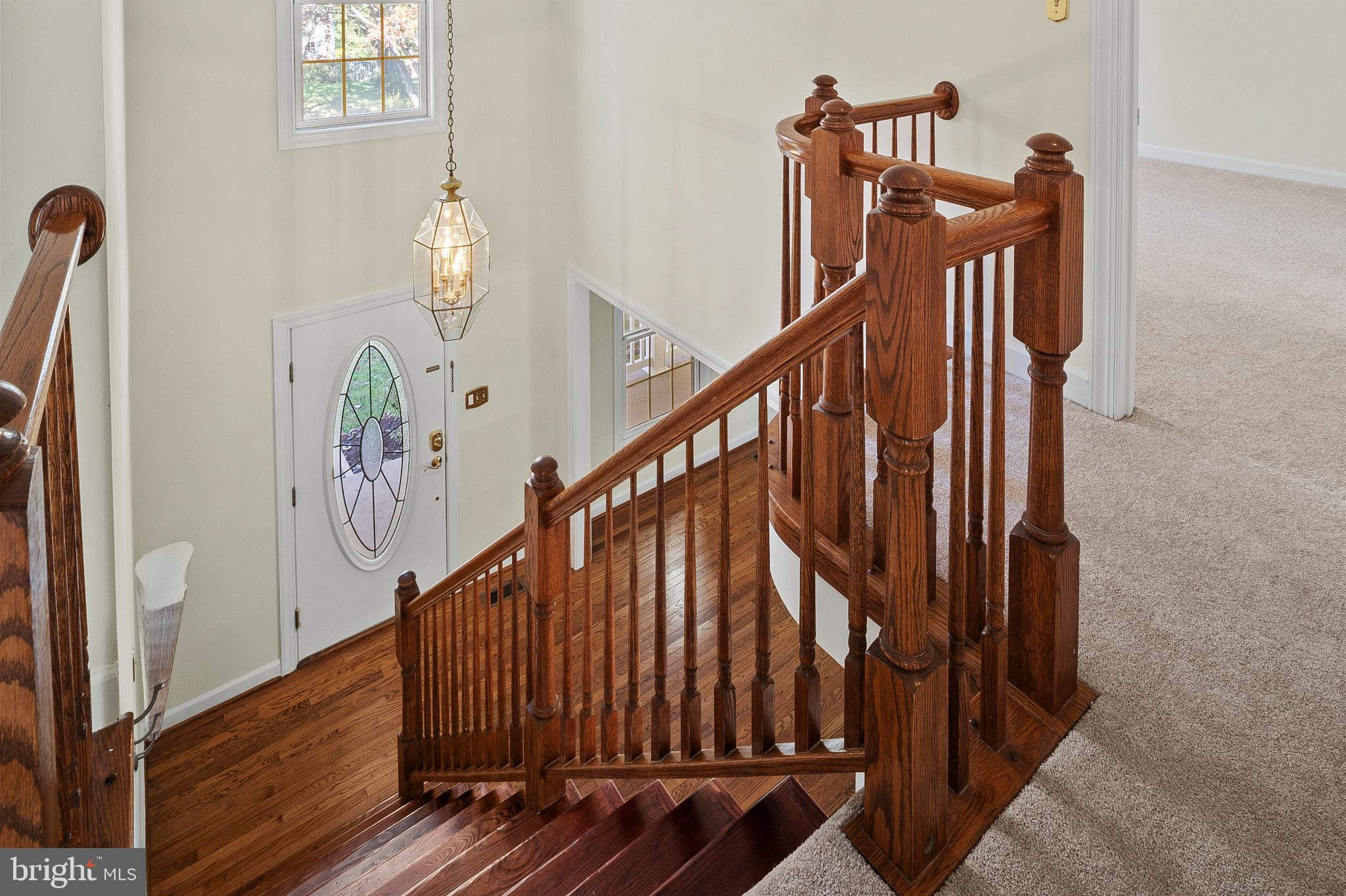 13808 Pleasant View Drive Bowie, MD 20720 - Photo 24 of 46 a view of stairs with wooden floor