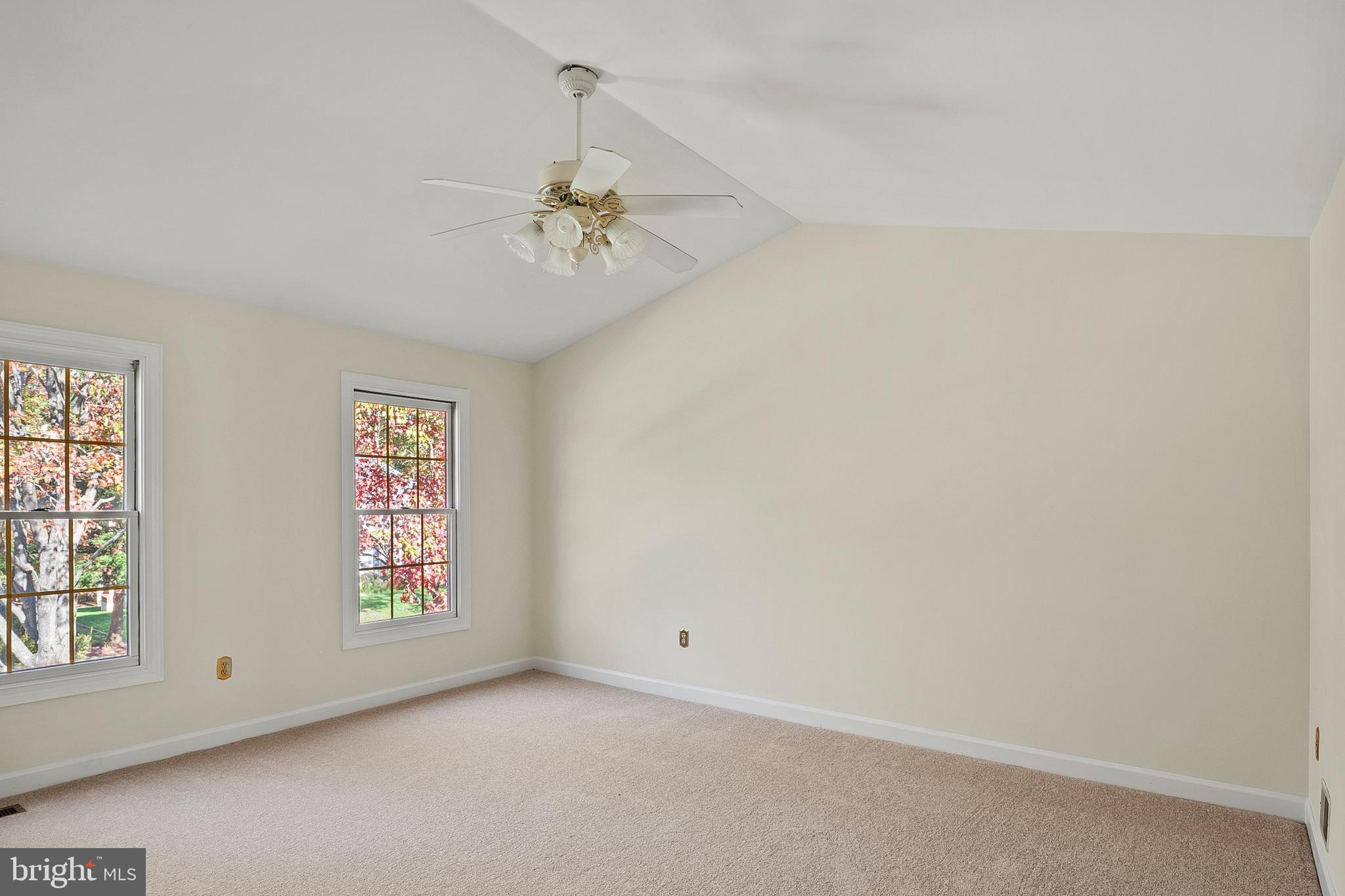 13808 Pleasant View Drive Bowie, MD 20720 - Photo 26 of 46 an empty room with windows and fan
