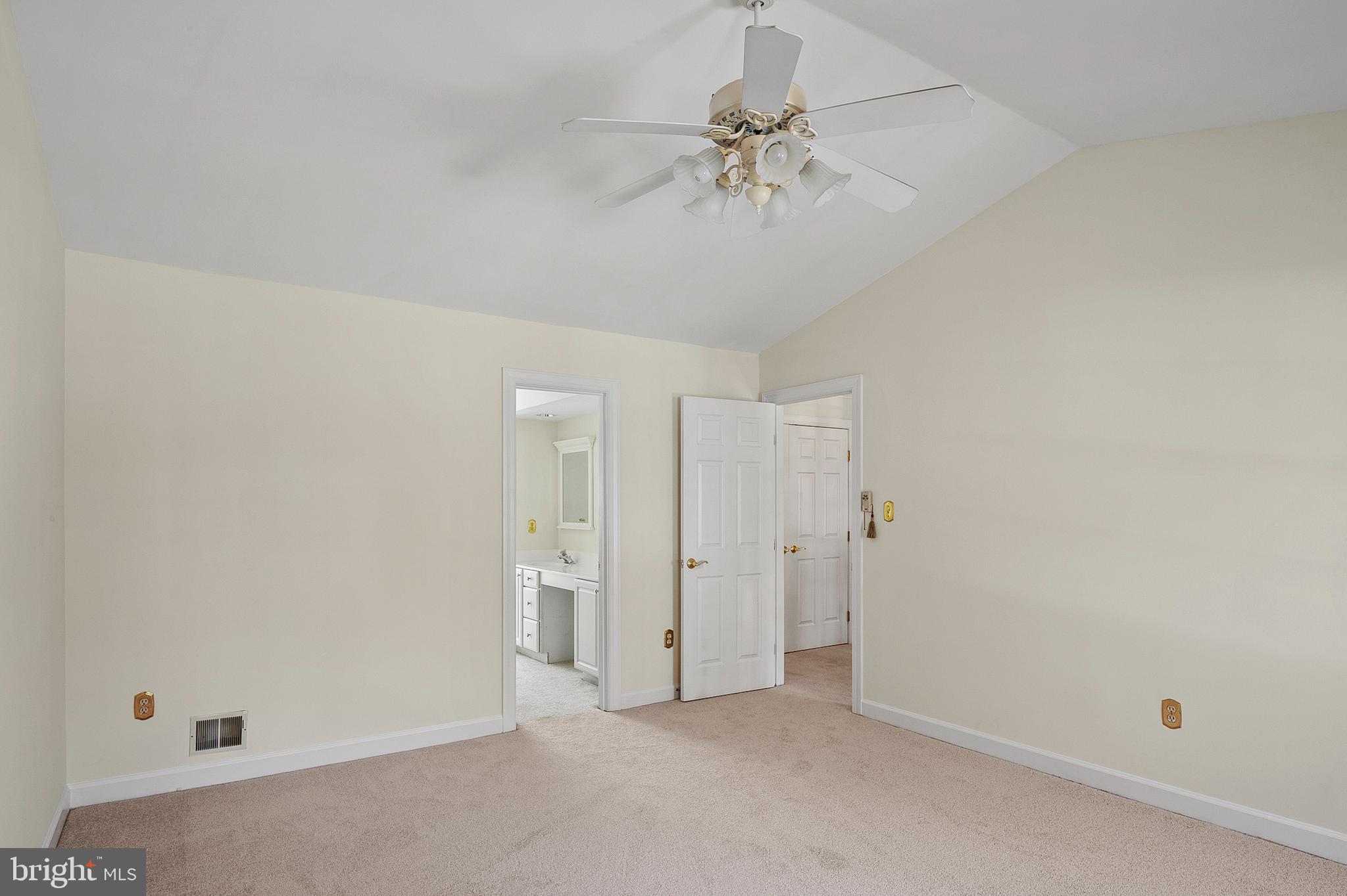 13808 Pleasant View Drive Bowie, MD 20720 - Photo 28 of 46 an empty room with a chandelier fan and closet