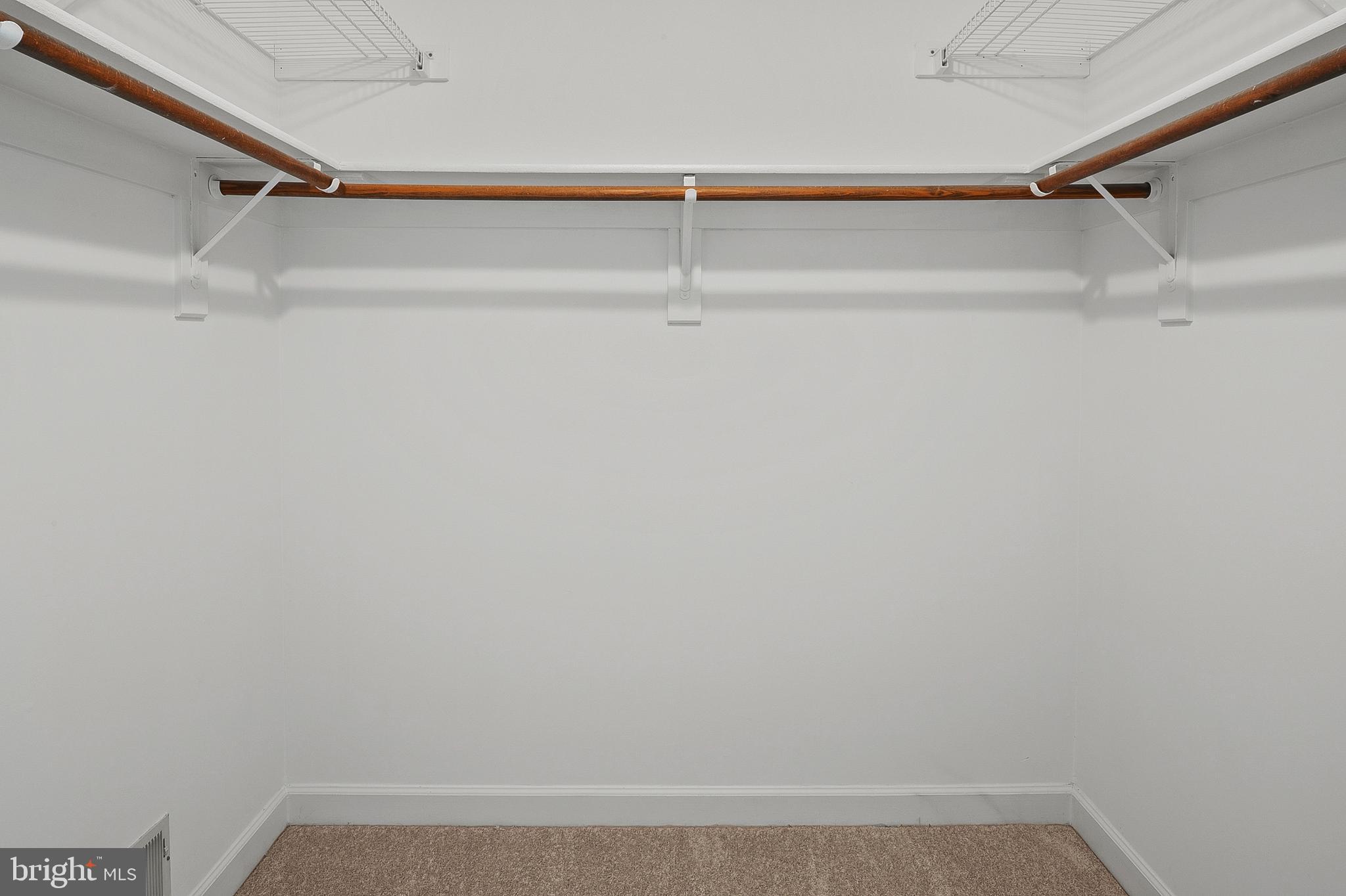 13808 Pleasant View Drive Bowie, MD 20720 - Photo 31 of 46 a view of a room with racks on the wall