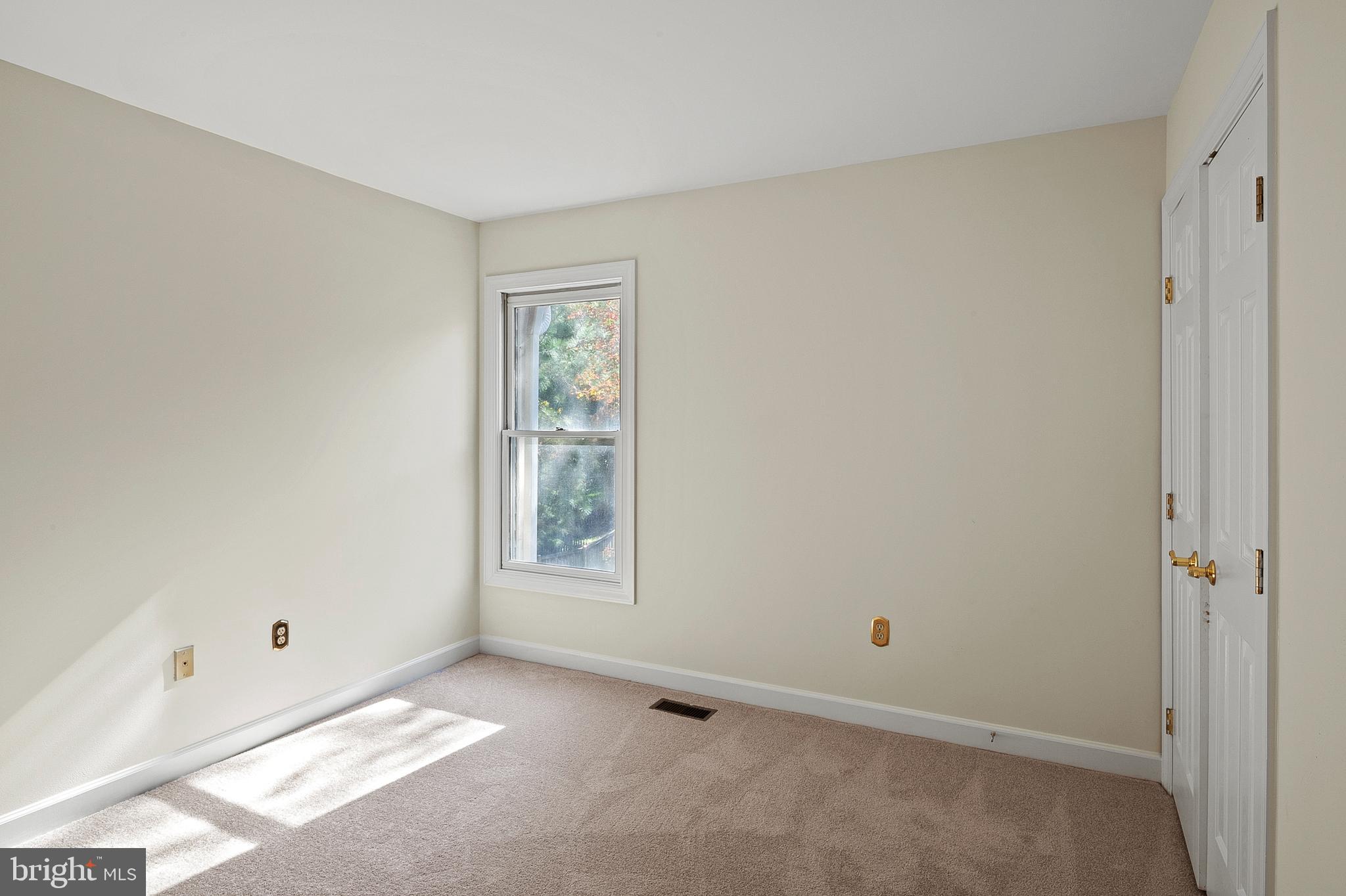 13808 Pleasant View Drive Bowie, MD 20720 - Photo 36 of 46 a view of an empty room with a window