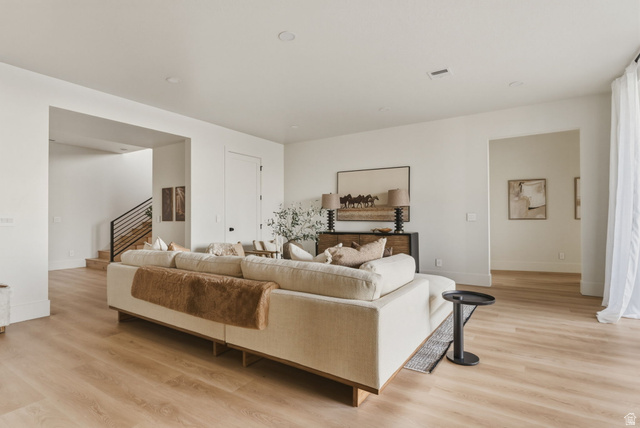 923 North Emery Lane Elk Ridge, UT 84651 - Photo 61 of 101 Bright interior space featuring light wood-finish flooring