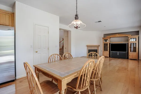 a living room with furniture fireplace and flat screen tv