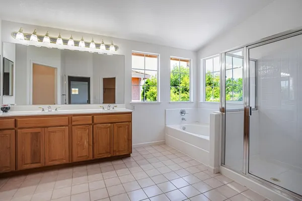 front view of a house with a garden