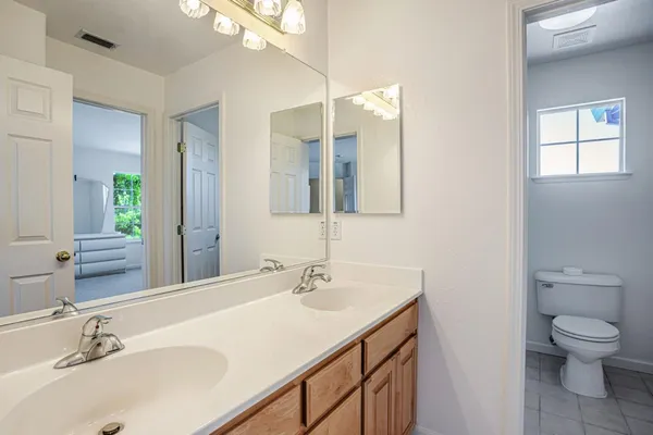an aerial view of residential house with outdoor space and lake view