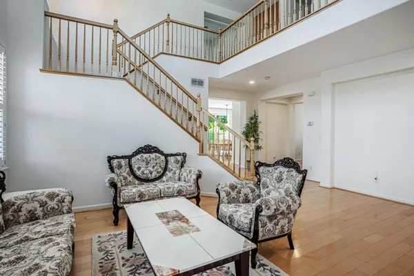 a kitchen with stainless steel appliances granite countertop refrigerator sink and cabinets