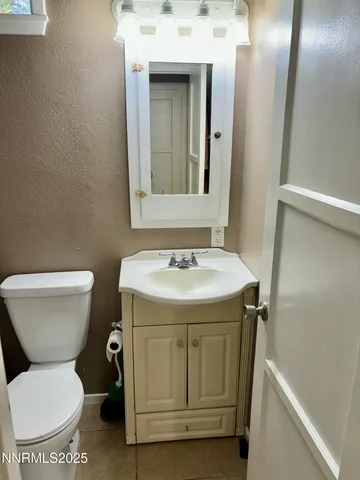 a bathroom with a sink and a toilet
