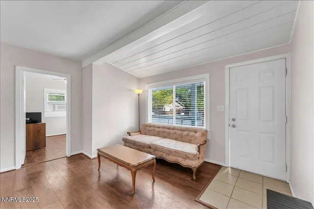 a room with furniture and a window