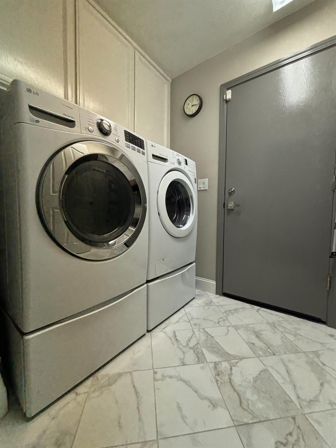 111 McCurry Street Wheatland, CA 95692 - Photo 43 of 55 a utility room with dryer and washer