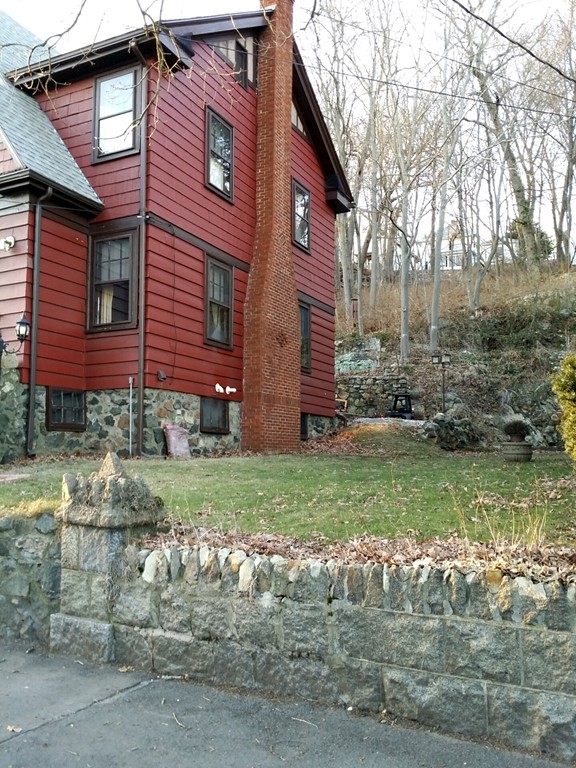 11 Linwood Road Lynn, MA 01905 - Photo 23 of 23 a view of a brick house with a yard