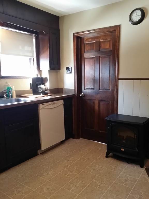 11 Linwood Road Lynn, MA 01905 - Photo 4 of 23 a kitchen with a refrigerator and a sink