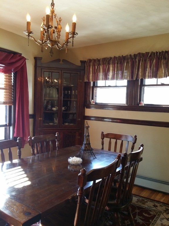 11 Linwood Road Lynn, MA 01905 - Photo 5 of 23 a view of a dining room with furniture and chandelier