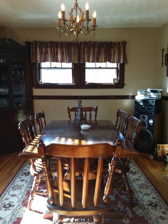11 Linwood Road Lynn, MA 01905 - Photo 7 of 23 a table with chairs and window