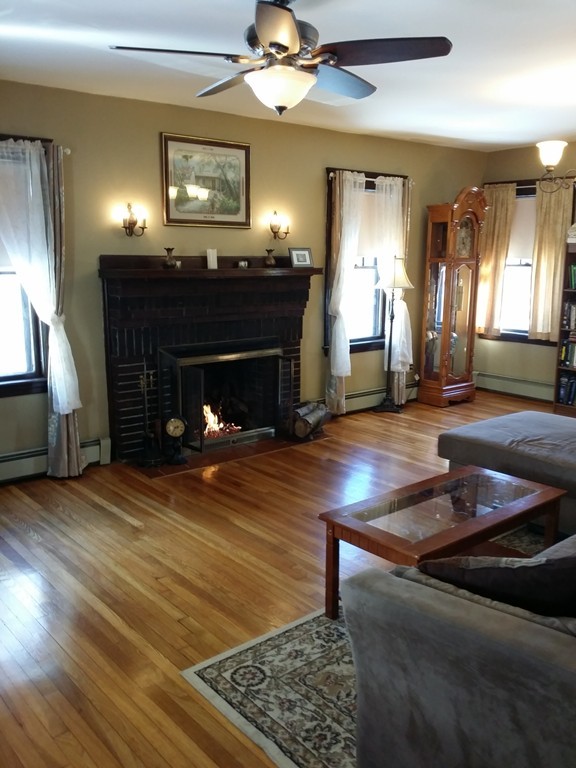 11 Linwood Road Lynn, MA 01905 - Photo 9 of 23 a living room with furniture and a fireplace