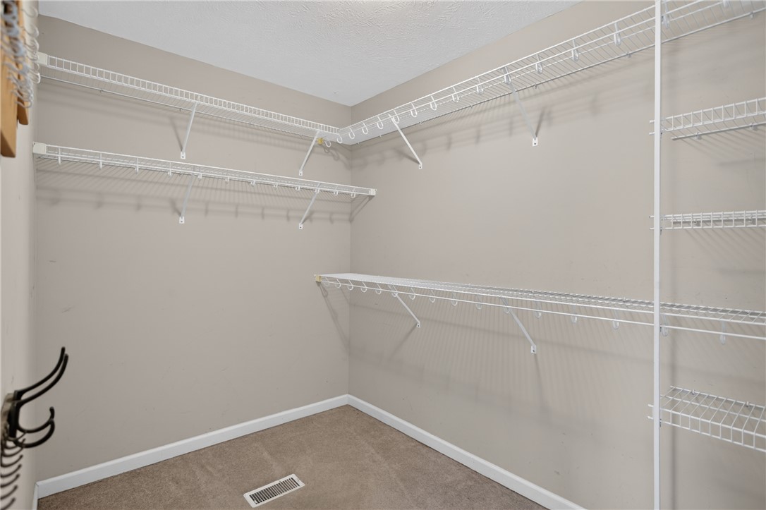 612 Providence Point Drive Seneca, SC 29678 - Photo 14 of 43 Ample wire shelving and hanging rods offer versatile storage solutions in this well-appointed closet.