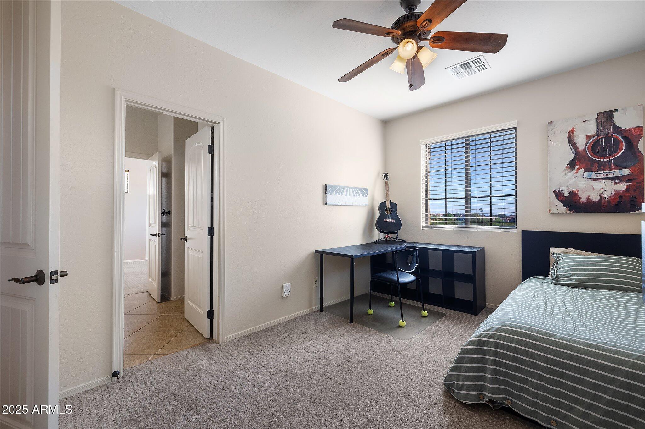 8536 East Inca Street Mesa, AZ 85207 - Photo 25 of 44 a bedroom with bed and a window