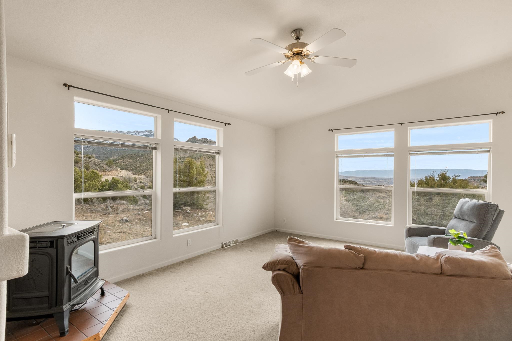 3984 Rapid Creek Road Palisade, CO 81526 - Photo 13 of 30 a living room with furniture and a window