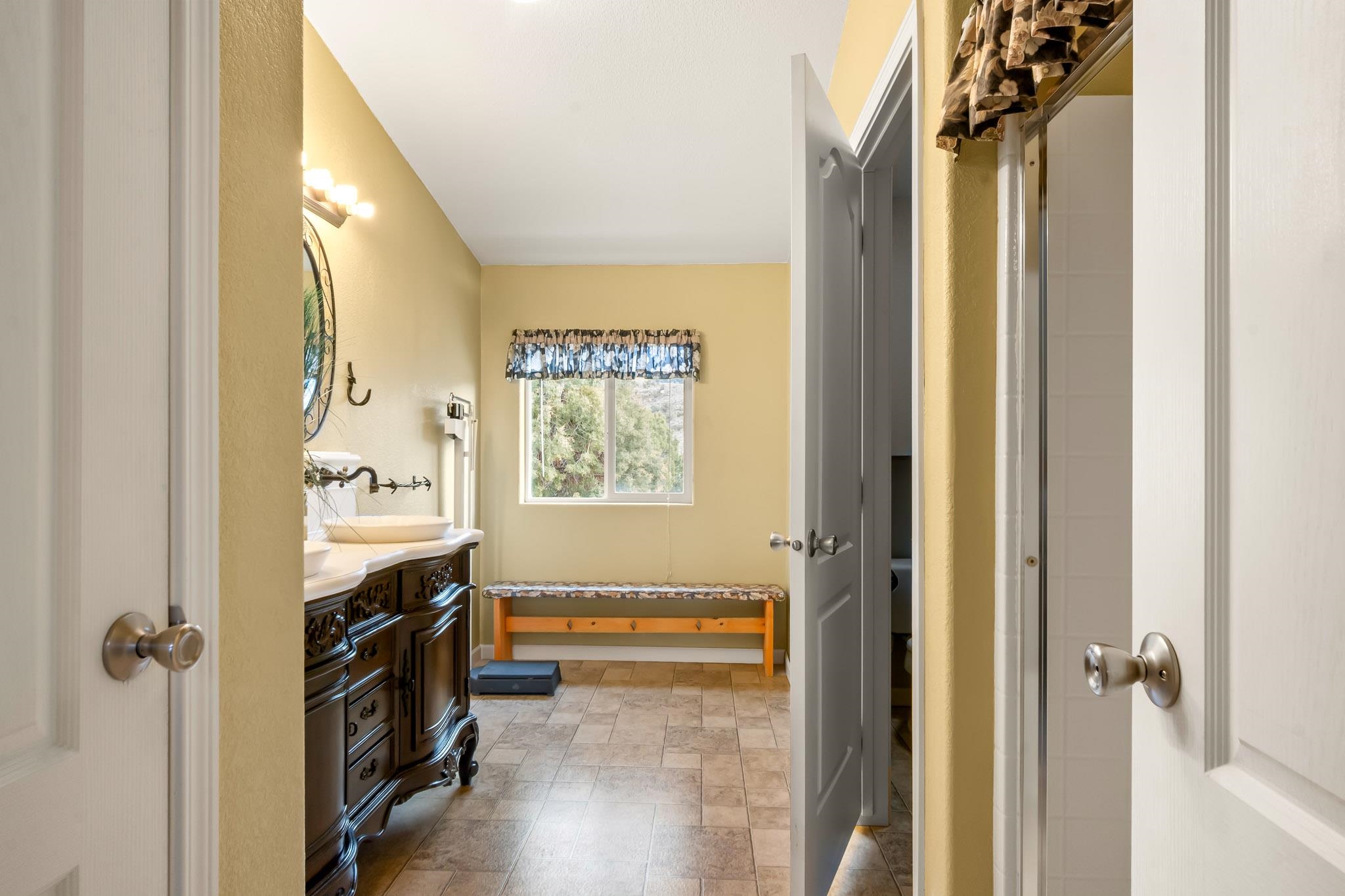 3984 Rapid Creek Road Palisade, CO 81526 - Photo 20 of 30 a view of a hallway and a livingroom with furniture