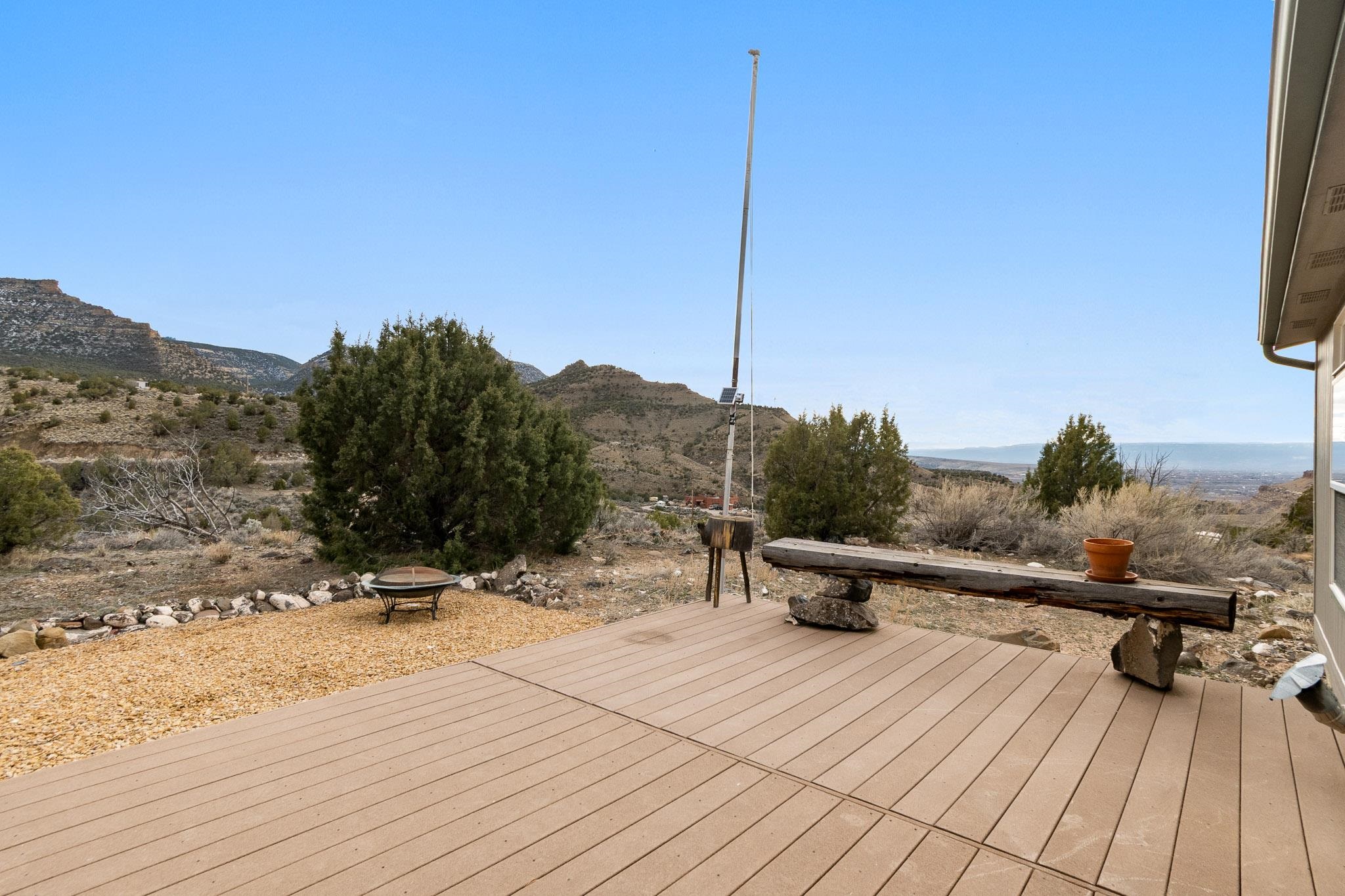3984 Rapid Creek Road Palisade, CO 81526 - Photo 26 of 30 a view of a terrace with a bench