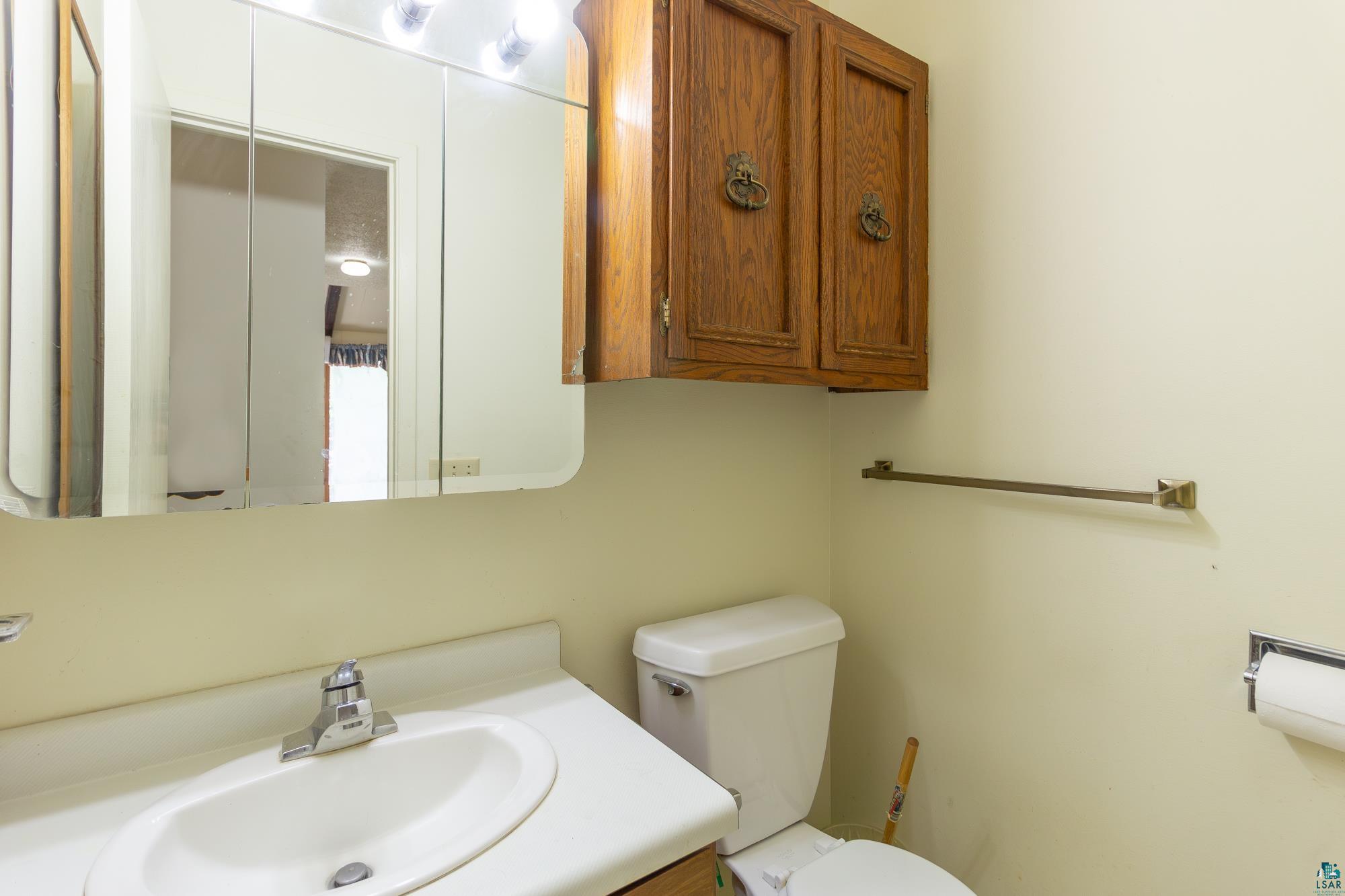 14687 North Country Road Ely, MN 55731 - Photo 17 of 44 Bathroom featuring toilet and vanity