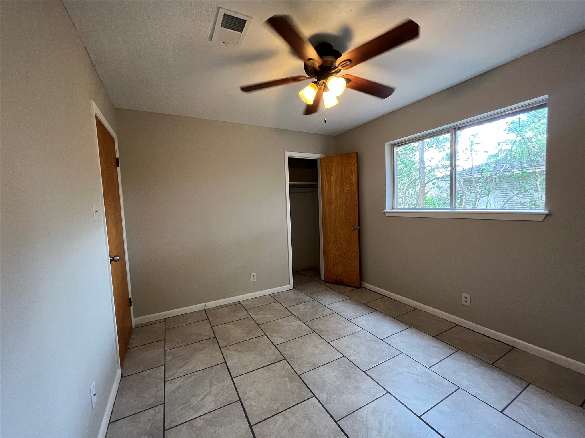 3924 Wickersham Street Bay City, TX 77414 - Photo 11 of 20 a view of an empty room with a window