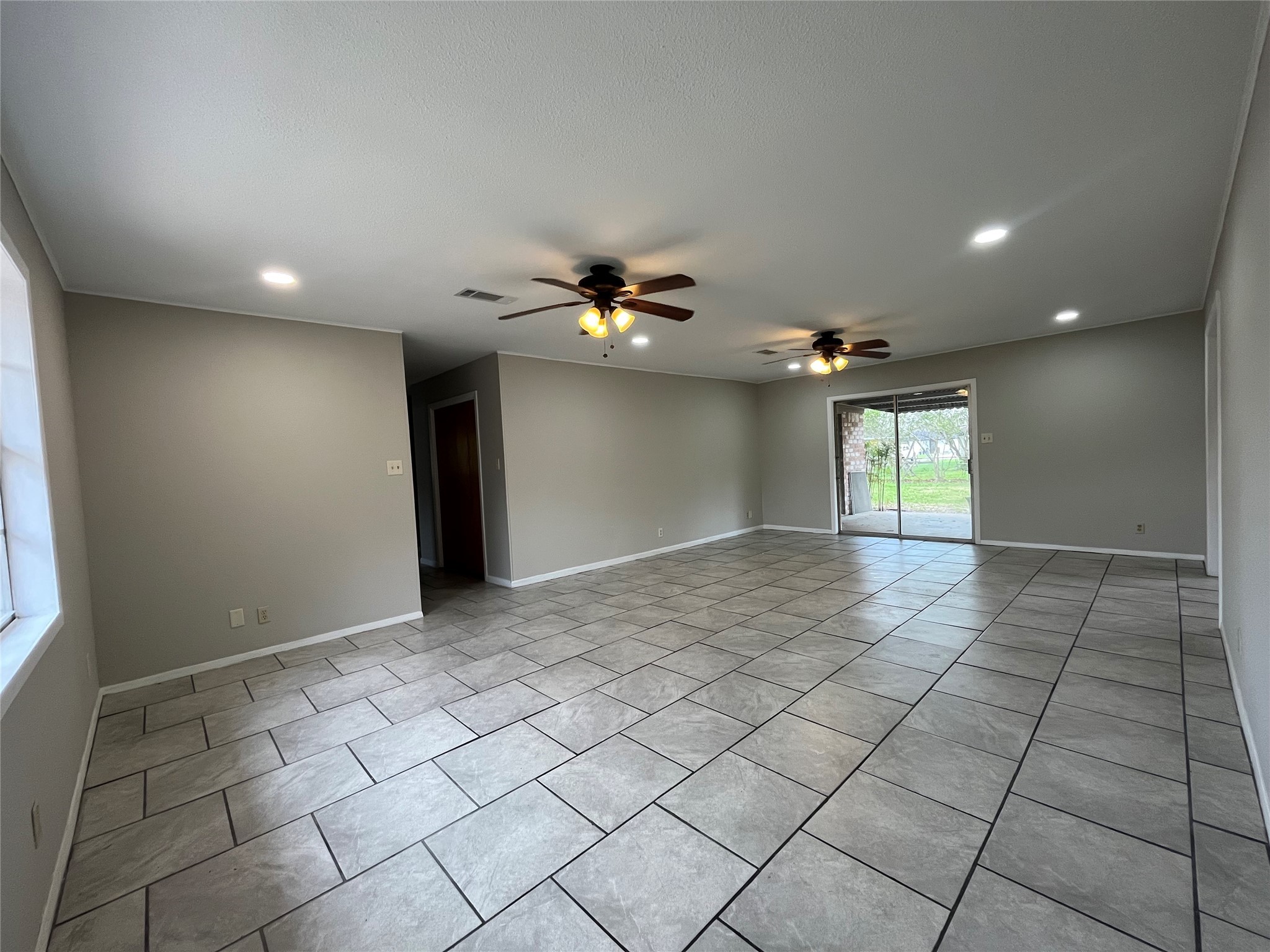 3924 Wickersham Street Bay City, TX 77414 - Photo 2 of 20 a view of an empty room and a window