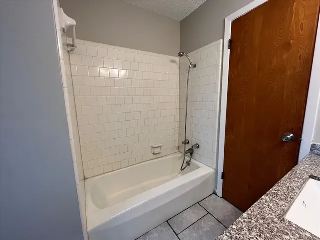 a bathroom with a bathtub