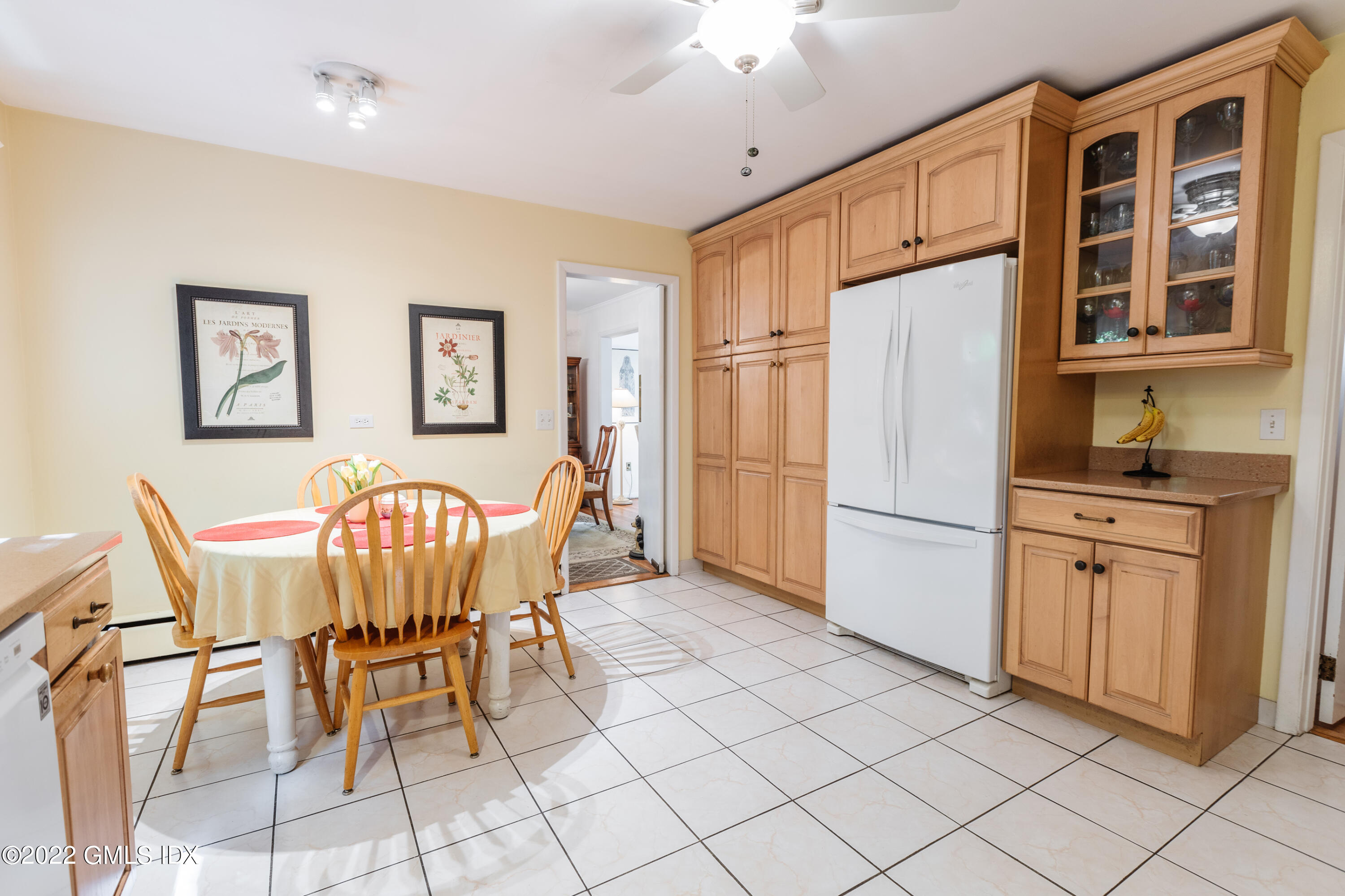 65 Laddins Rock Road Old Greenwich, CT 06870 - Photo 12 of 40 a view of kitchen with furniture and refrigerator