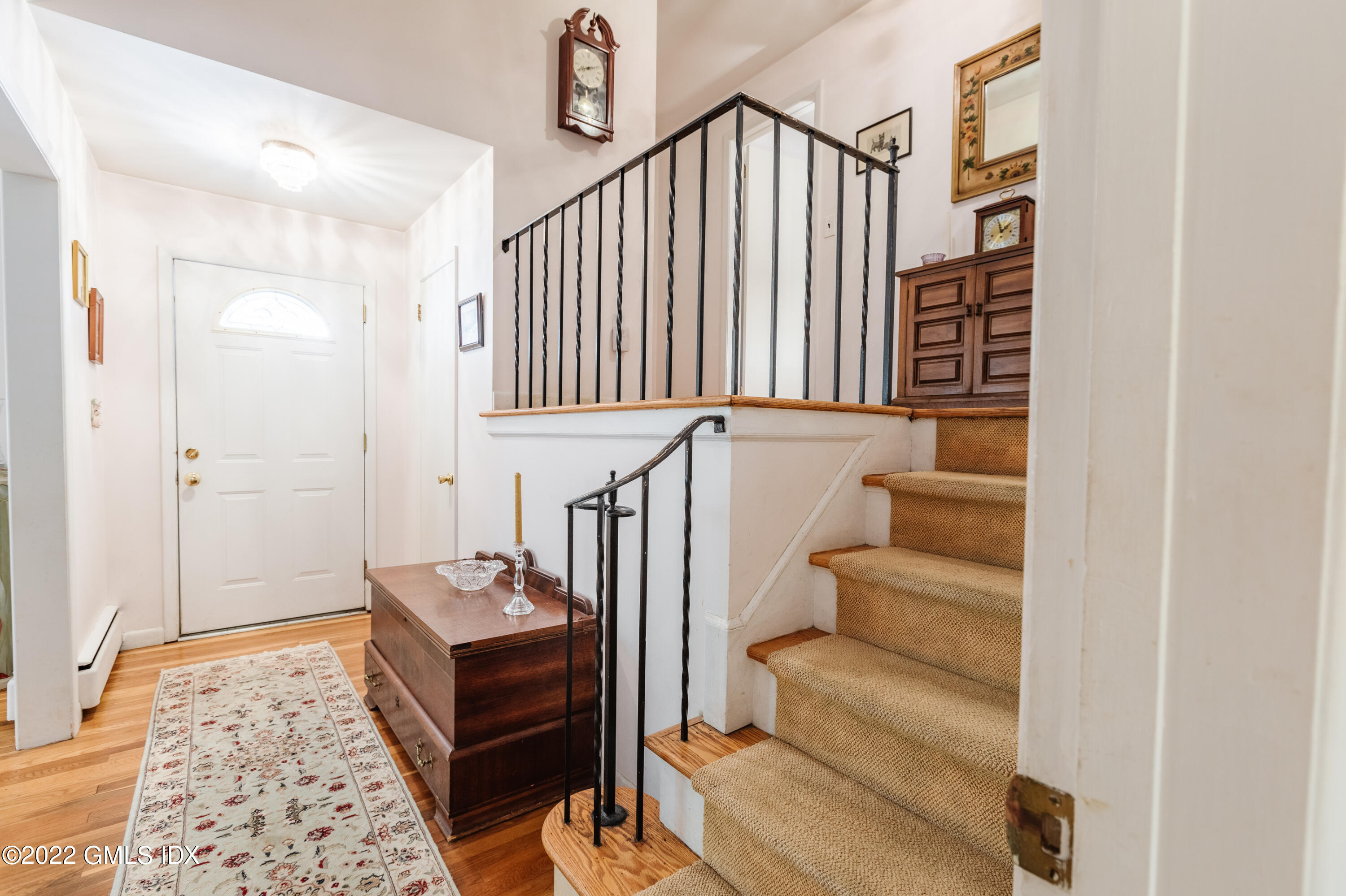 65 Laddins Rock Road Old Greenwich, CT 06870 - Photo 14 of 40 a living room with furniture and a rug